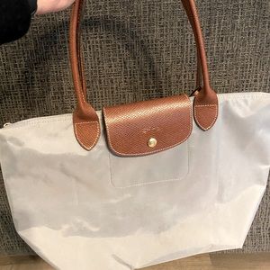 Gently used light gray longchamp bag